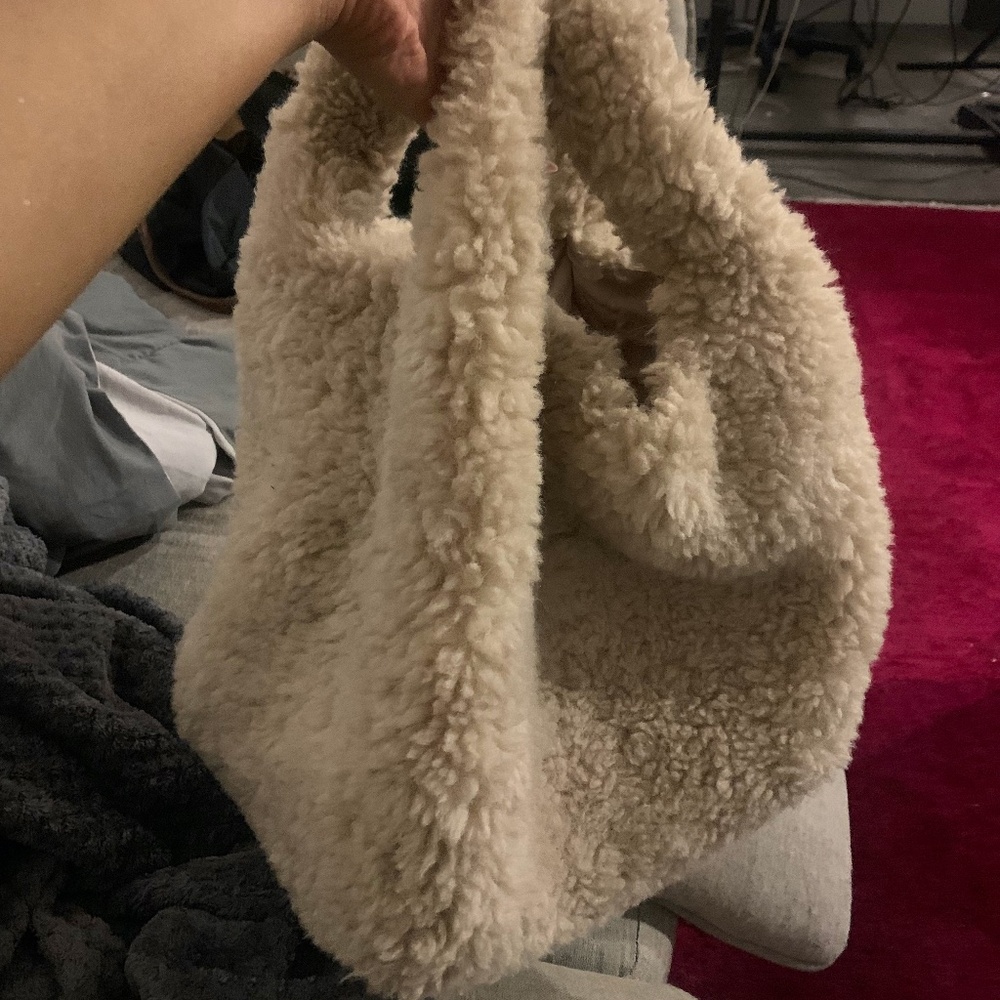 Revolve Fur bucket bag